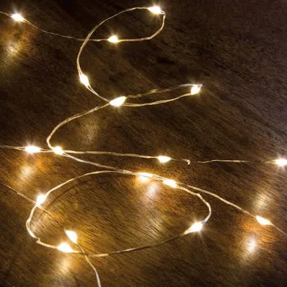Soft glow rice lights on copper strand for Nativity display accessory